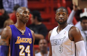 Feb 10, 2013; Miami, FL, USA; Los Angeles Lakers shooting guard Kobe Bryant (24) and Miami Heat shooting guard Dwyane Wade (3) during the second half at American Airlines Arena. Miami won 107-97. Mandatory Credit: Steve Mitchell-USA TODAY Sports