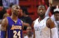 Feb 10, 2013; Miami, FL, USA; Los Angeles Lakers shooting guard Kobe Bryant (24) and Miami Heat shooting guard Dwyane Wade (3) during the second half at American Airlines Arena. Miami won 107-97. Mandatory Credit: Steve Mitchell-USA TODAY Sports